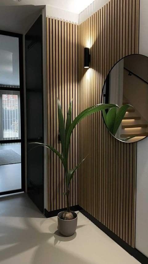 Panel WPC para recibidor con espejo redondo y aplique de pared LED